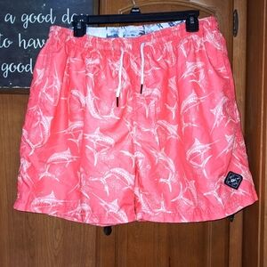 A pair of Spucy Tuna men's swim trunks in a size XL. Like new condition.